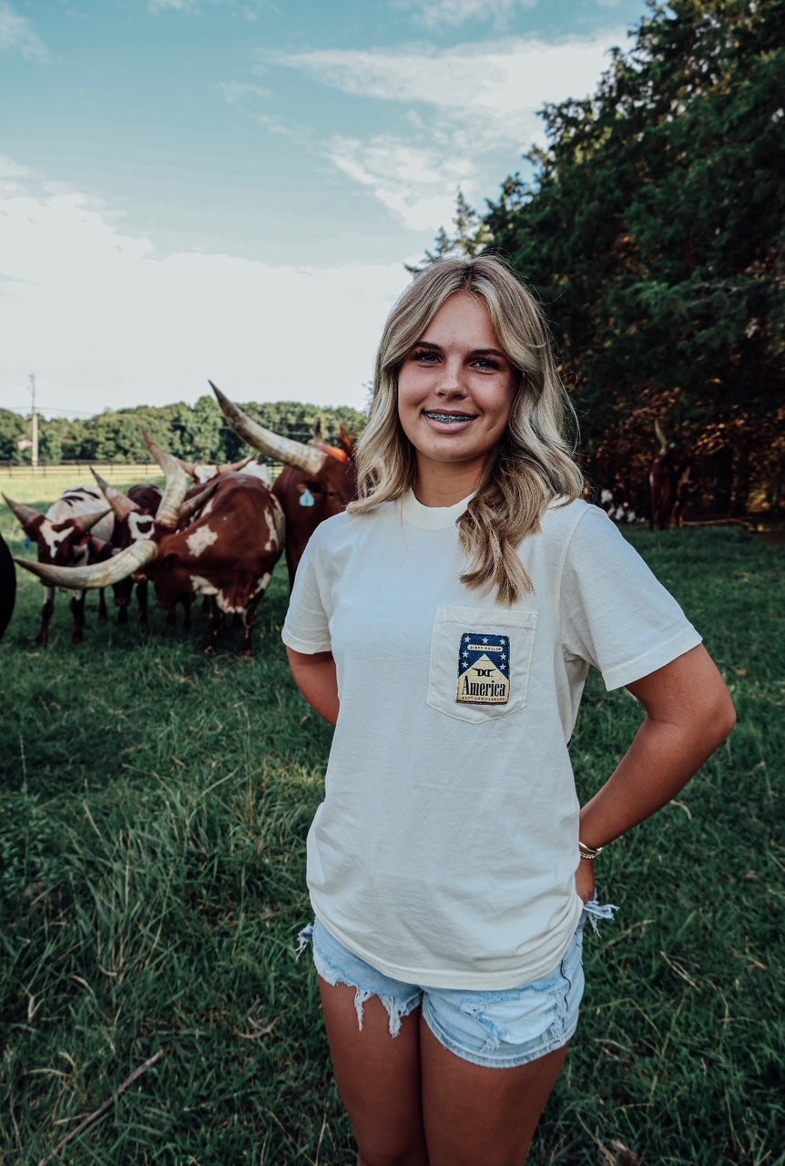 Ivory Comfort Colors Dirty Dollar Ranch Flag Pocket Short Sleeve Tee